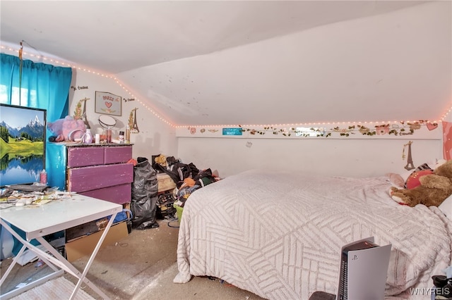 bedroom with vaulted ceiling