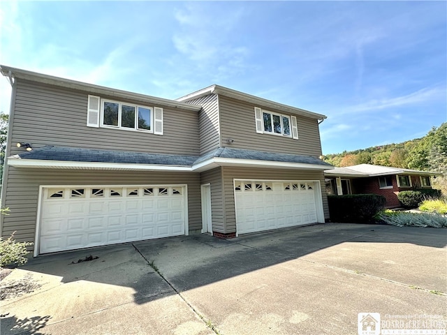 view of property with a garage