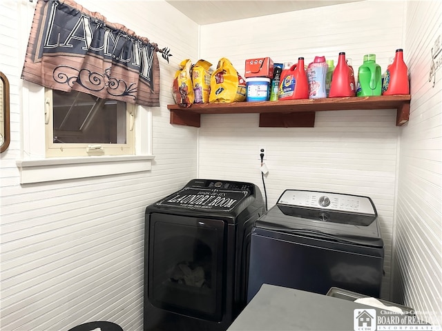 clothes washing area with washer and dryer