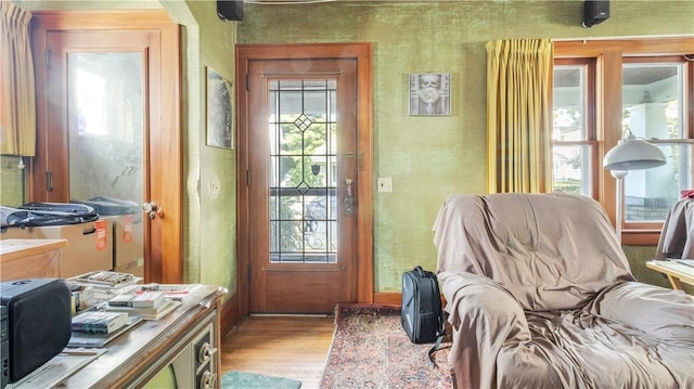 doorway to outside featuring light wood-type flooring