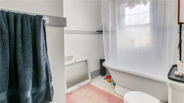 bathroom with tile patterned flooring