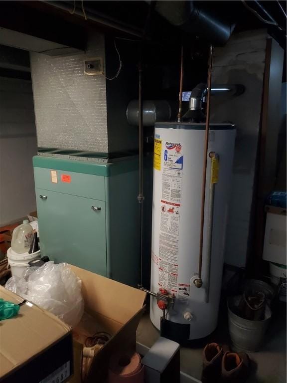 utility room with gas water heater