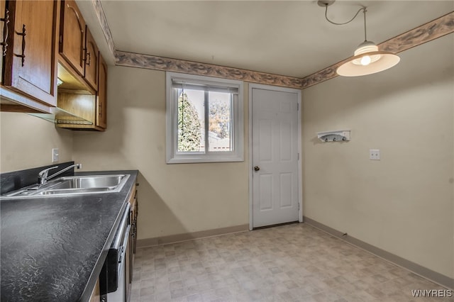 kitchen featuring dishwasher and sink