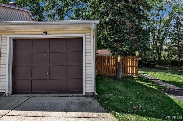 garage with a lawn