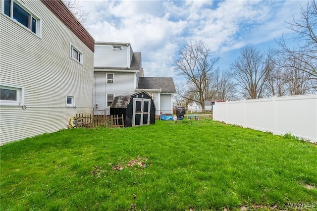 view of yard with a storage unit