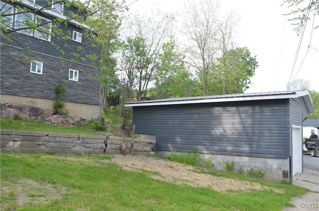 view of home's exterior with a lawn