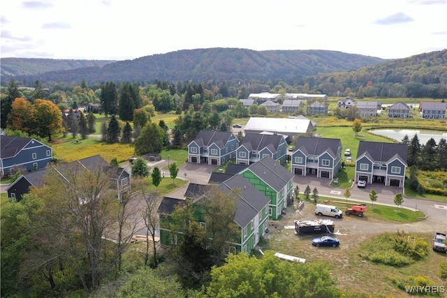 drone / aerial view featuring a mountain view