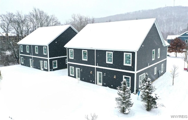 view of snow covered property