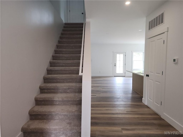 28 Glen Burn Trl, Ellicottville, NY 14731 - staircase featuring wood finished floors, recessed lighting, and baseboards