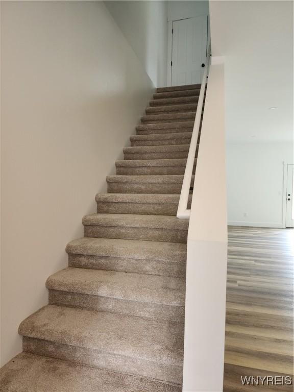 28 Glen Burn Trl, Ellicottville, NY 14731 - stairs with wood finished floors