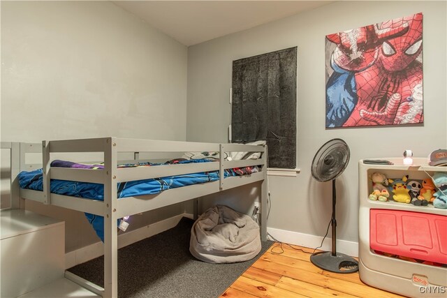 bedroom featuring hardwood / wood-style floors