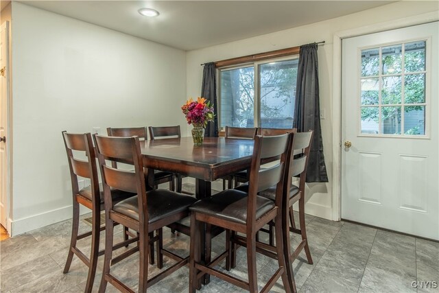 dining space with a healthy amount of sunlight