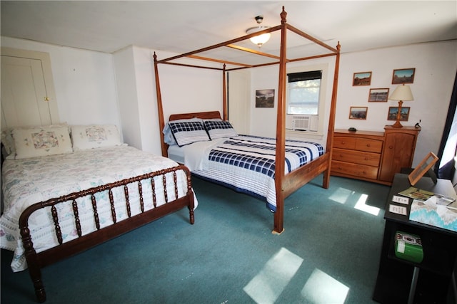 bedroom featuring carpet floors and cooling unit