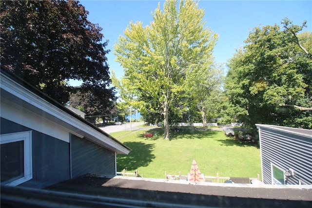 view of yard with a fire pit