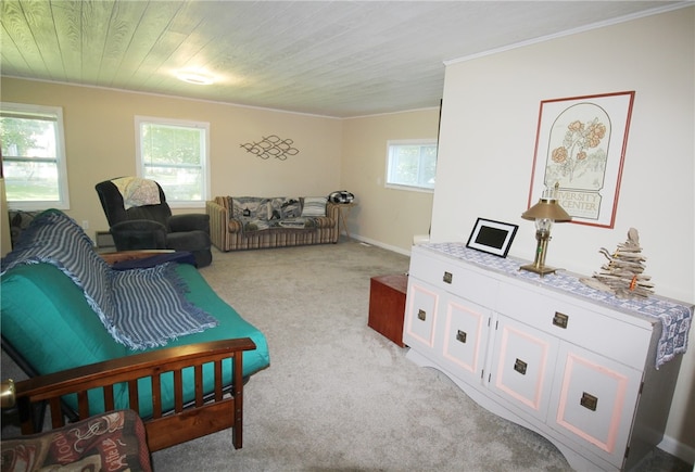 living room featuring light carpet, wooden ceiling, and a wealth of natural light