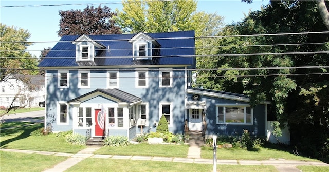 view of front of property with a front yard