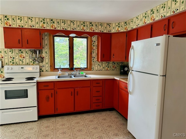 kitchen with white appliances and sink