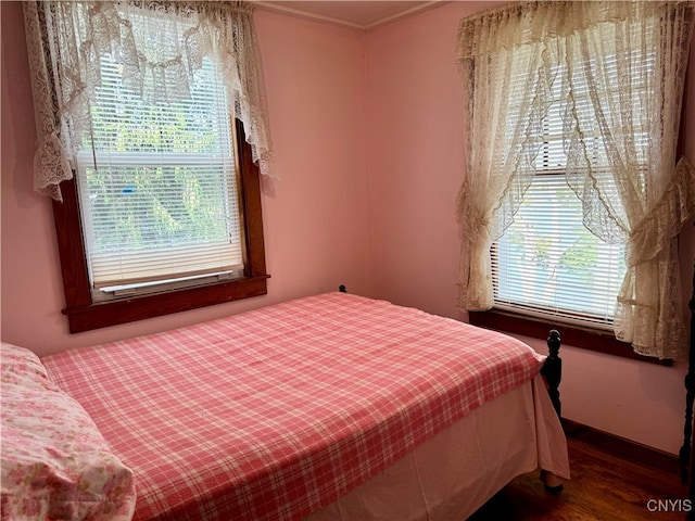 bedroom featuring hardwood / wood-style flooring