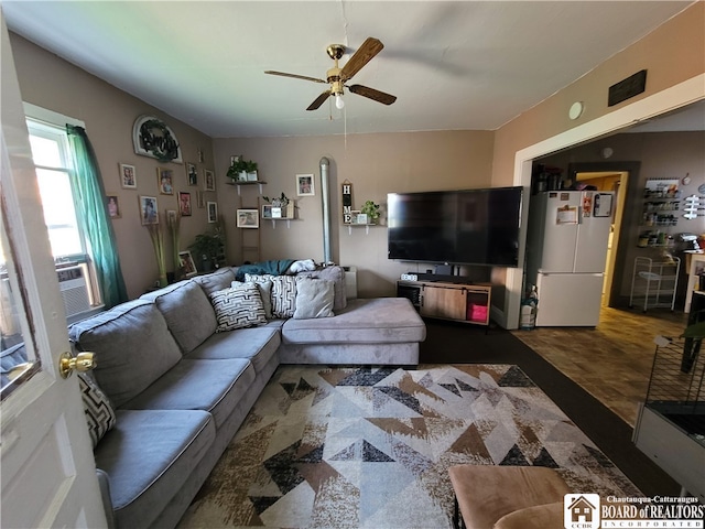 living room featuring ceiling fan