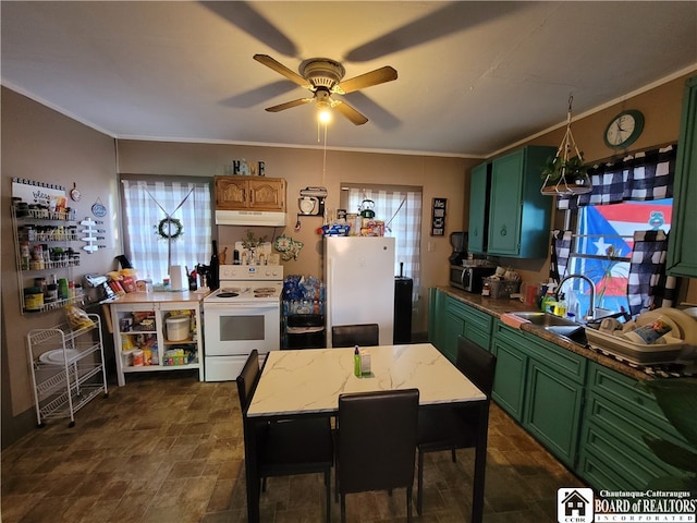 kitchen featuring sink, green cabinets, white appliances, crown molding, and ceiling fan