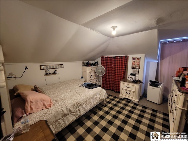 bedroom with vaulted ceiling