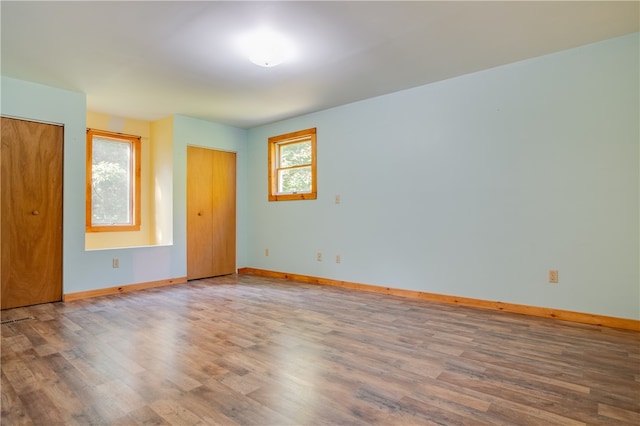 empty room featuring wood-type flooring