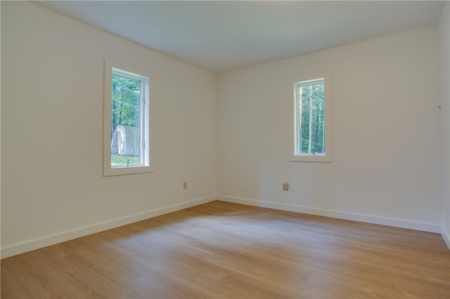 empty room featuring light hardwood / wood-style floors