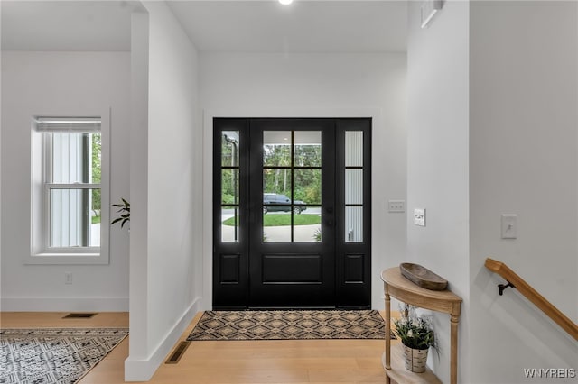 entrance foyer featuring light hardwood / wood-style floors