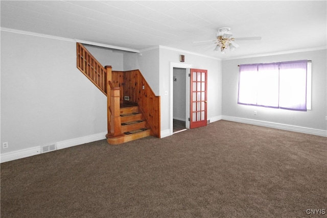 unfurnished room with crown molding, ceiling fan, and dark carpet