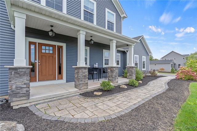 entrance to property with a porch