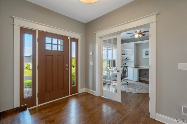 foyer featuring french doors and dark wood-type flooring