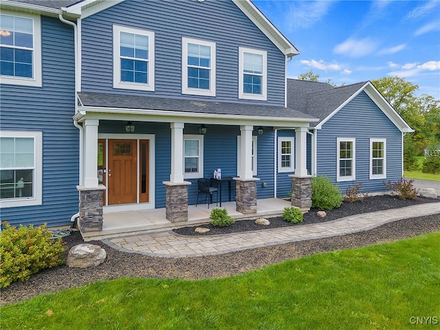 craftsman-style home with covered porch