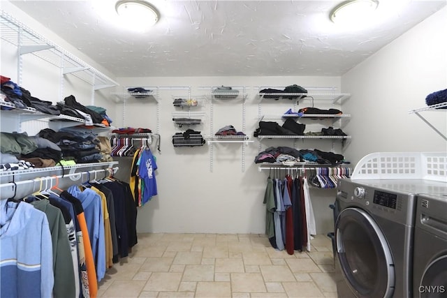 laundry area with washing machine and dryer