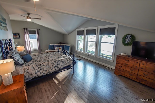 bedroom with vaulted ceiling, ceiling fan, and dark wood-type flooring