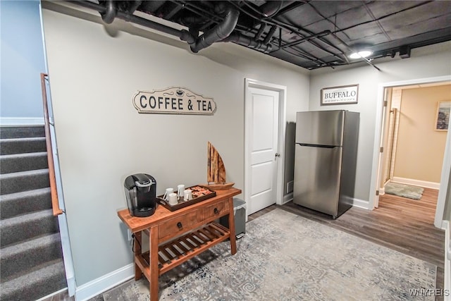 hallway with wood-type flooring