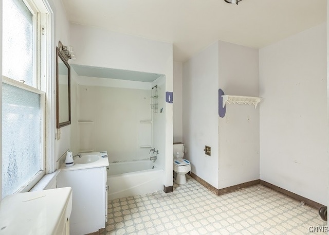 full bathroom with bathing tub / shower combination, plenty of natural light, vanity, and toilet