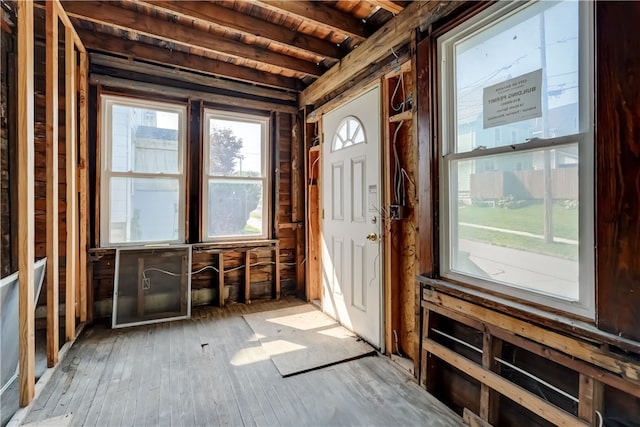 misc room featuring wood ceiling, beam ceiling, and hardwood / wood-style flooring