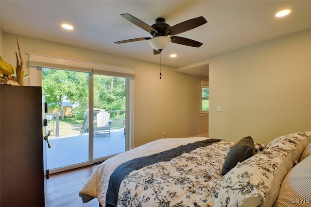 bedroom with access to outside, light wood-type flooring, and ceiling fan