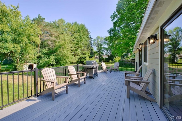 61 High St, Alexandria, NY 13607 - wooden terrace with a grill and view of scattered trees