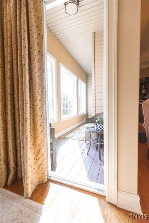 doorway to outside with hardwood / wood-style flooring