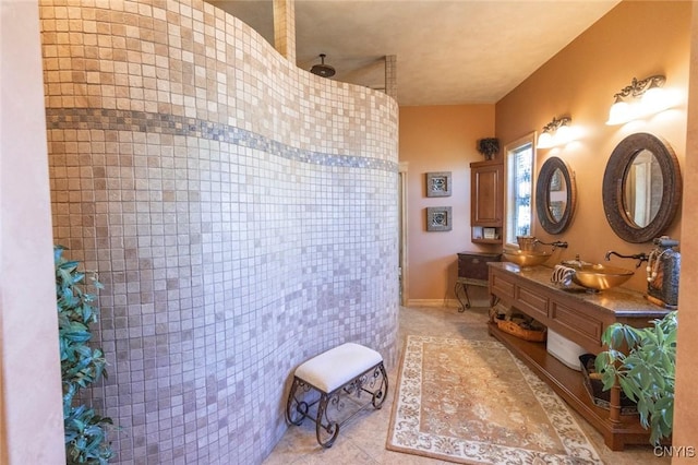 bathroom featuring tile patterned floors and vanity