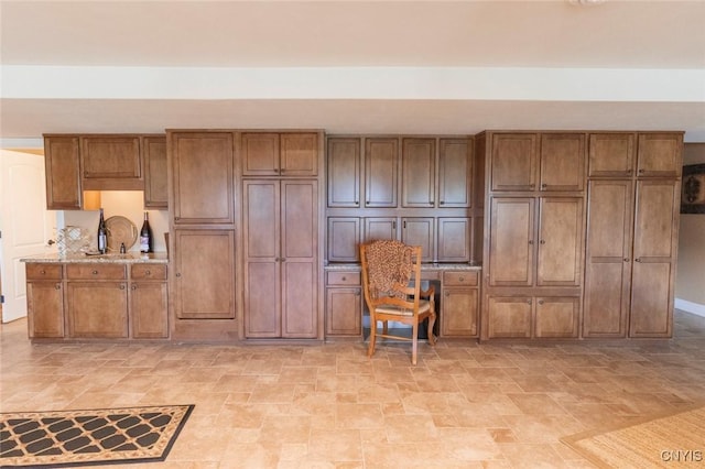 kitchen with light stone counters