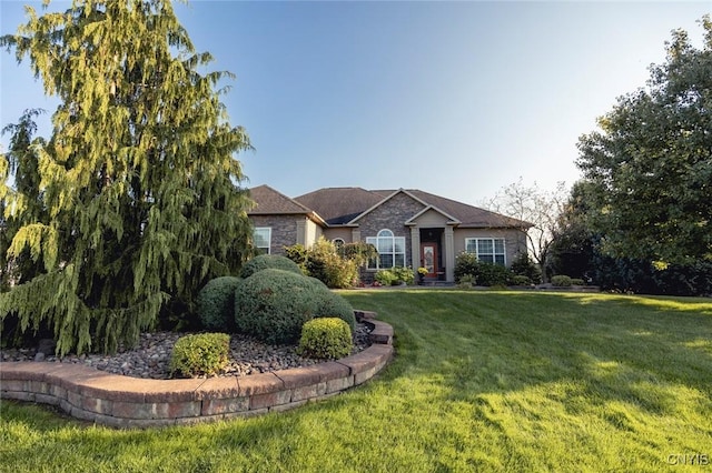 ranch-style home with a front yard