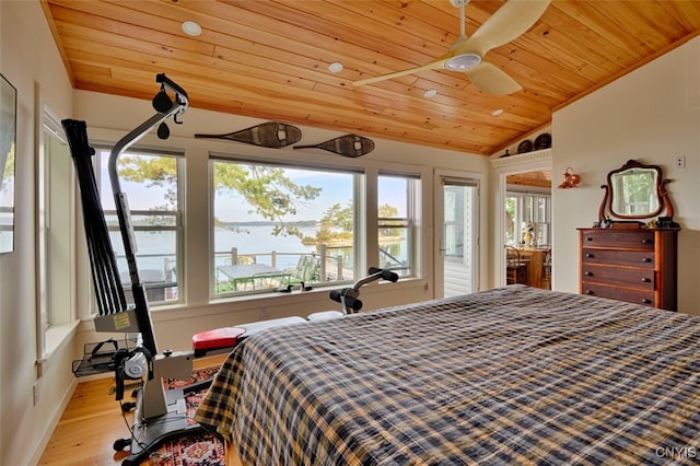 bedroom featuring ceiling fan, light hardwood / wood-style flooring, vaulted ceiling, and wooden ceiling