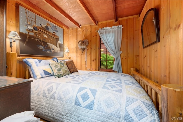 bedroom with wooden walls, beam ceiling, and wood ceiling