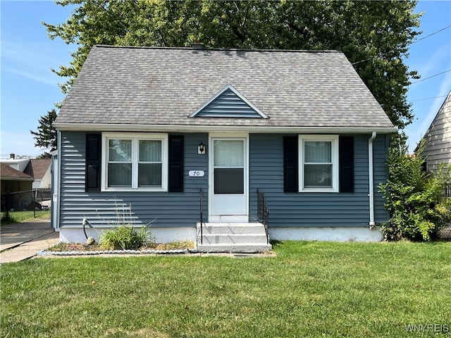 bungalow with a front yard