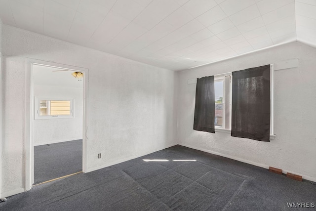 empty room with carpet and ceiling fan