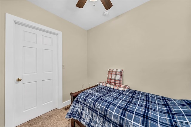 bedroom featuring carpet and ceiling fan