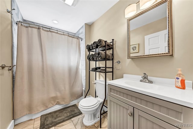 bathroom featuring walk in shower, vanity, and toilet