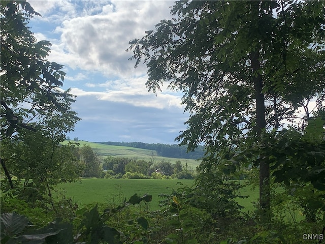 view of mountain feature featuring a rural view